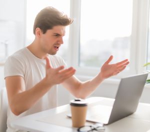 Frustrated laptop user